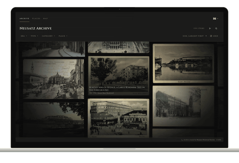 The Wall on a laptop, dragged slowly: a dark masonry grid of old postcards and photographs of Novi Sad moving under the archive's header